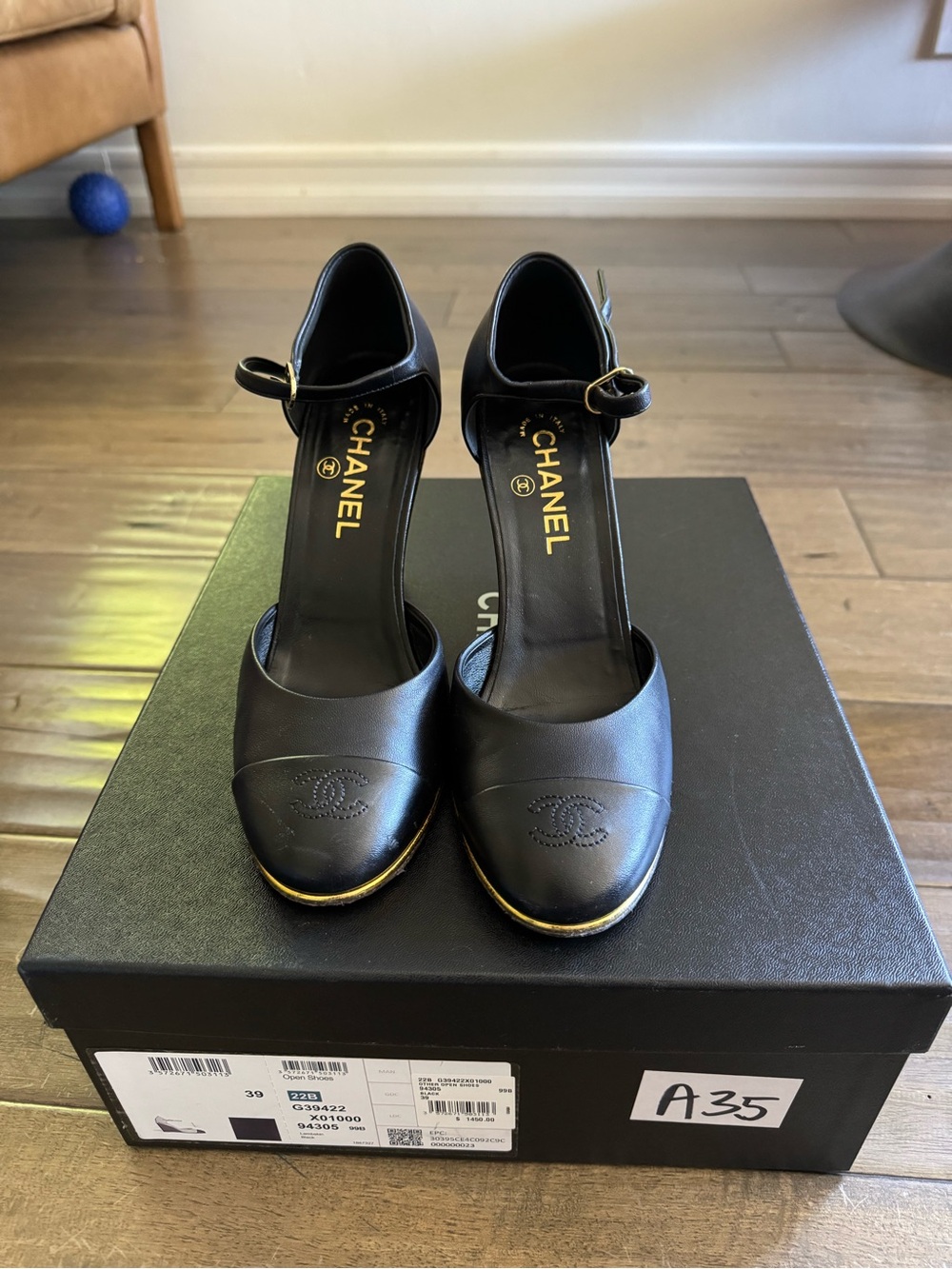 CHANEL Black Leather Ankle-Strap Pumps with Gold Accent